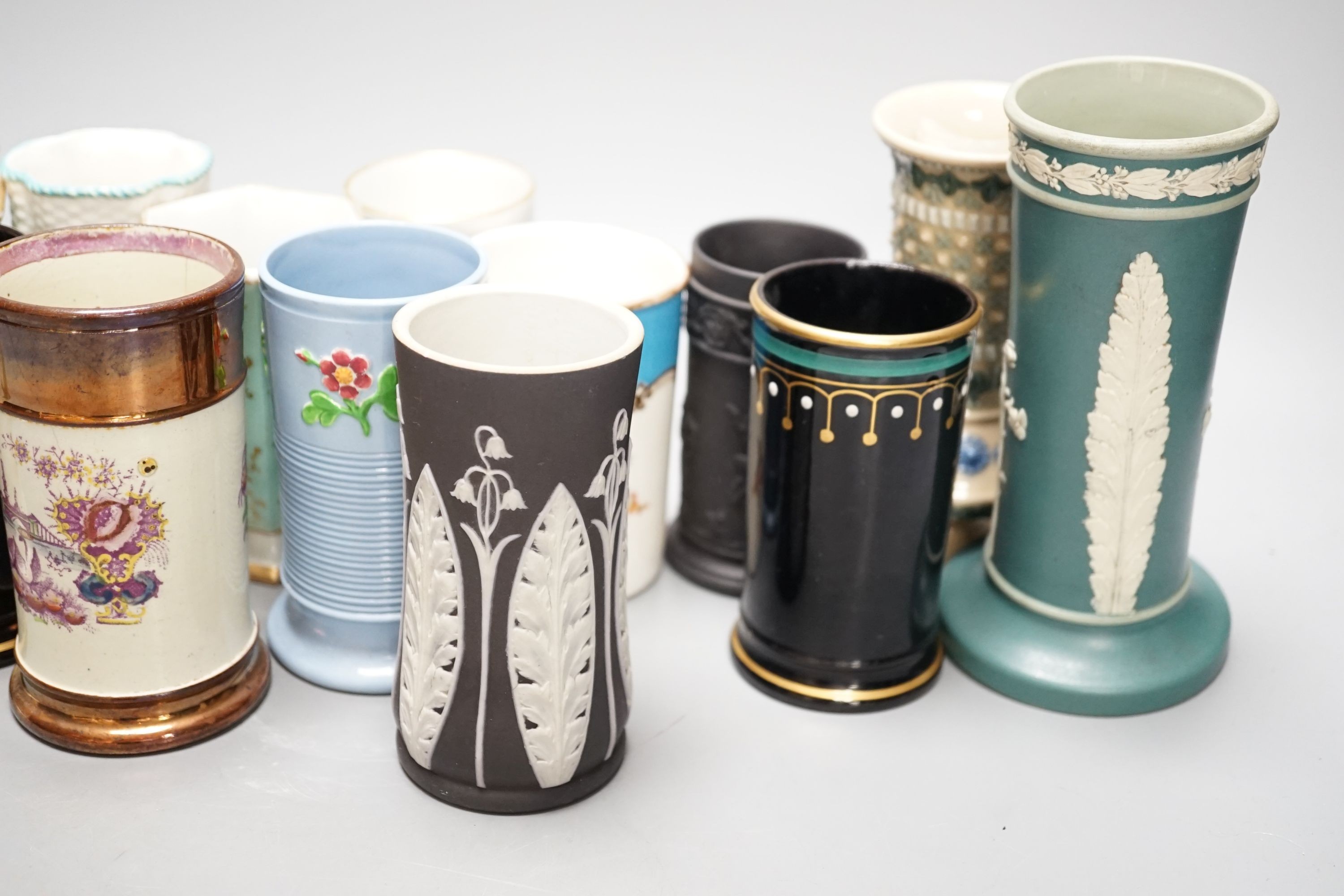 Eighteen various Victorian ceramic spill vases, including Masons and Dudson, tallest 16cm.
